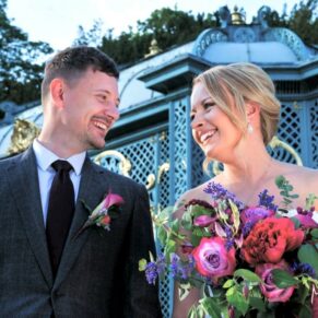 Candid and reportage Buckinghamshire wedding photographer - the newlyweds captured as they walk towards my camera in an outdoor setting