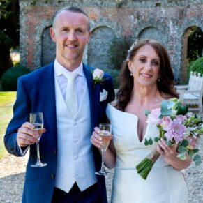 The newly married couple take a stroll in the lovely grounds of this stunning country house venue