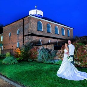The newlyweds captured at dusk with a little help from my floodlighting in front of the Kings Chapel in Old Amersham