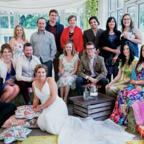 Buckinghamshire Marquee Wedding Photography - a relaxed group pose inside this funky interior