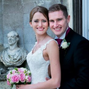 The smiling newlyweds pose for my camera in the grounds of this historic Buckinghamshire venue