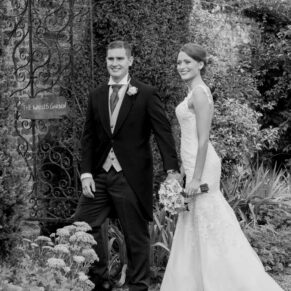 The newlyweds enjoy a stroll in the seven acres of gardens at this historic venue