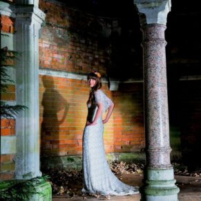 Buckinghamshire Winter Wedding Photography - dramatic bridal portrait captured after dark at the Tudor Barn in Burnham