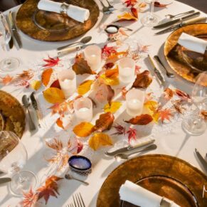 Buckinghamshire Winter Wedding Photography - autumnal table centrepiece lit dramatically