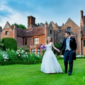 The newlyweds take a stroll in the lovely grounds of this historic Hertfordshire venue