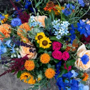Stunning multi coloured summer bouquet for the bride