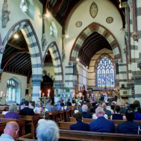 The parish church interior taken during the marriage ceremony at this summer wedding