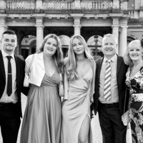 Photography of wedding guests arriving at the front of Cliveden House for the marriage ceremony