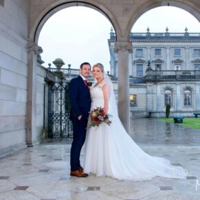 The newlyweds pose for the camera in the Cockrell Pavilion at their Cliveden House Hotel wedding