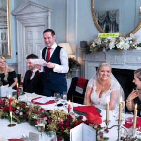 Lively groom's wedding speech in progress in The Boudoir at Cliveden House