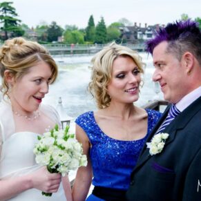 A little banter between friends always provides great photo opportunities - captured beside the weir on the River Thames