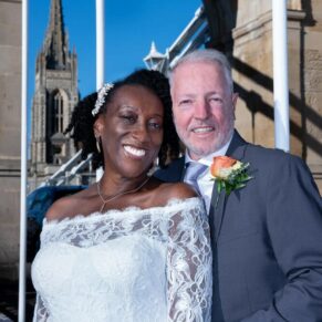 The happy bride and groom captured on the famous Marlow Bridge next to their Compleat Angler wedding reception venue