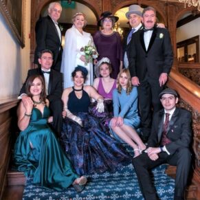 Group pose on the grand internal staircase at this historic hotel