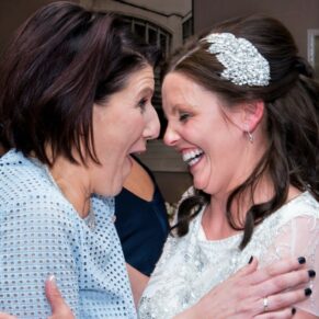 Gatsby Berkhamsted - Hertfordshire Wedding Photographer - laughter and giggles for the bride with her girlfriend