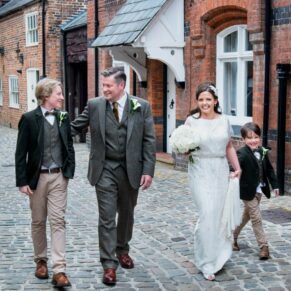 Gatsby Berkhamsted - Hertfordshire Wedding Photographer -  the newlyweds take a stroll on a nearby cobbled street