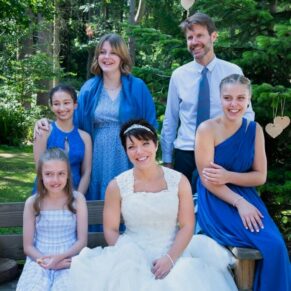 A relaxed group pose of the bride with some friends in this wonderful woodland setting in Buckinghamshire