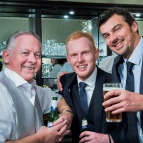 Three lads enjoying a drink in the bar during this very relaxed drinks reception