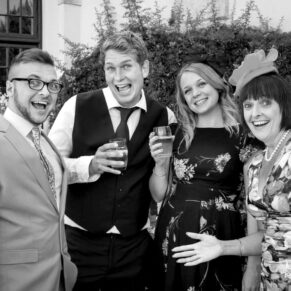 A fun wedding guest pose taken during the drinks reception at this Buckinghamshire venue