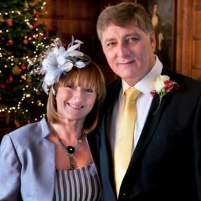 The newlyweds pose for a close-up shot in the Great Hall soon after their Christmas marriage ceremony