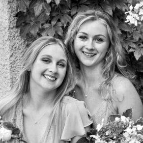 Two bridesmaids pose for my camera in the gardens of this stunning venue