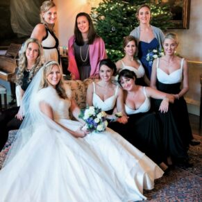 The bride captured with some of her girlfriends next to the Christmas tree