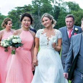 A casual photo captured on a walk about with the newlyweds and their bridal party at Hartwell House