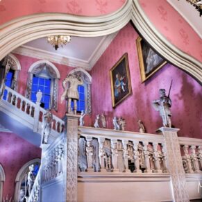 The grand Jacobean staircase at Hartwell House captured at dusk with some dramatic lighting