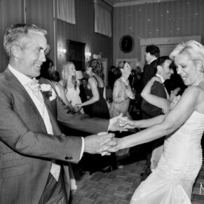 The newlyweds going for it on the dancefloor with some wild moves at their Hartwell House wedding
