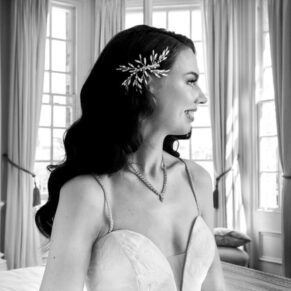 Dramatic black and white pose of the bride captured before the ceremony on her Hedsor House wedding day