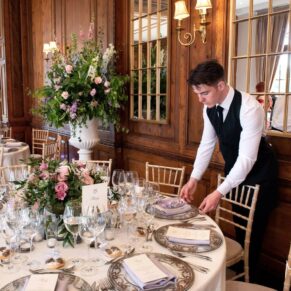 Hedsor House wedding perfection at its very best as the staff at this historic venue finalise the table setup