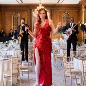 The Function Band pose for my camera just before the newlyweds grand entrance into the meal! These guys are seriously talented, and they totally blew the roof off during their live performance. Not only do they perform during the wedding breakfast, but they also sing during the evening's entertainment on the dance-floor. I'm pleased to report that they were super helpful too when I suggested a few posed pictures! The Function Band all setup in the dining room to perform at this Hedsor House wedding