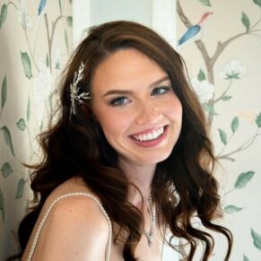 The bride poses for my camera with gorgeous window lighting at this Hedsor House wedding