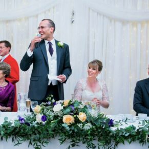 The groom's lively speech in progress captured during his Latimer Estate wedding