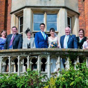 Some of the wedding guests captured on the garden terrace of the Latimer Estate