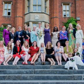 Wedding family photography group pose on the fabulous outdoor stone staircase at the Latimer Estate