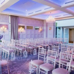 The indoor ceremony room setup with gorgeous lighting effects illuminating the interiors at the Latimer Estate