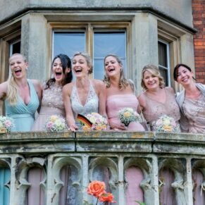 A fun shot of the ladies captured on the terrace at this Latimer Estate wedding