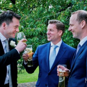 Lads banter during the drinks reception at this Latimer Estate wedding