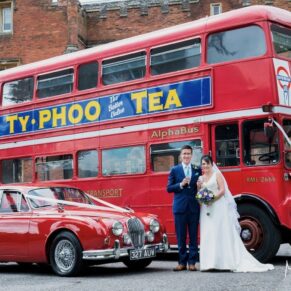 Photography of the newlyweds with their fleet of red vehicles by the main house on their Latimer Estate wedding day