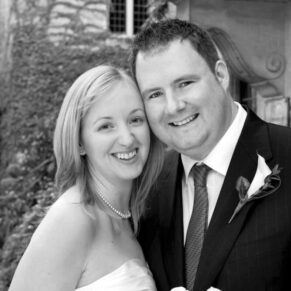 The newlyweds pose for my camera in this black and white capture at Le Manoir Aux Quat Saisons