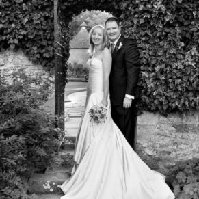 The newlyweds captured in the gardens for this black and white pose at their Le Manoir Aux Quat Saisons wedding