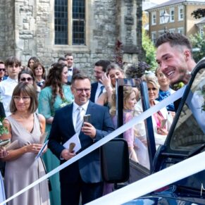 The couple departing the church for their nearby garden reception in Old Windsor