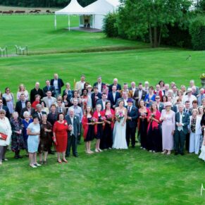 Micklefield Hall Wedding Photography - everyone captured from high above with the marquee in the background