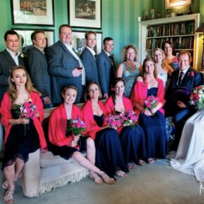 Micklefield Hall Wedding Photography - the bridal party in a group pose inside the main house