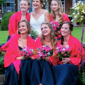 Micklefield Hall Wedding Photography - the bridesmaids join the bride on the steps for a photo opportunity