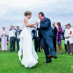 Micklefield Hall Wedding Photography - the newlyweds doing their first dance in the wonderful grounds