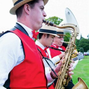 Micklefield Hall Wedding Photography - the dixieland jazz band perform during the drinks reception