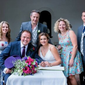 Micklefield Hall Wedding Photography - signing of the the register with the witnesses