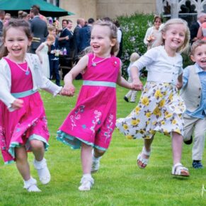 These giggling children just wanted to run around non-stop all day for my camera