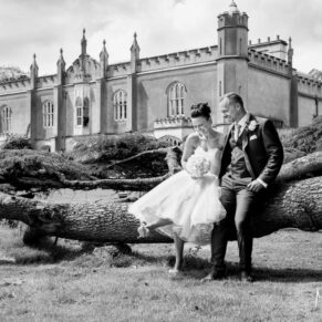 The bride and groom captured enjoying the moment under the huge 400 year old cedar tree in the gorgeous gardens